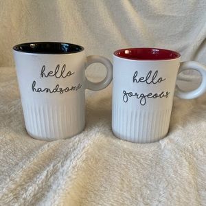 His and hers coffee mugs. “Hello gorgeous” and “hello handsome”